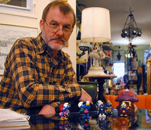 Jarry begrudgingly appraises yet another collection of Smurfs.